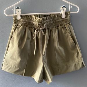 Never worn-green shorts size small
